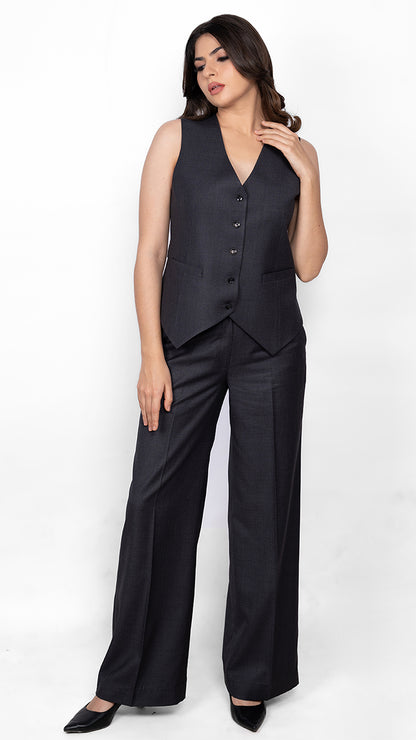 A smart dark grey combination of a tailored waistcoat and straight-fit trousers. A stylish alternative to full suits for formal and semi-formal occasions.