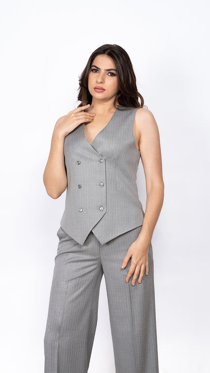 A sophisticated waistcoat and straight-fit trouser set in grey pinstripes, offering a structured yet sleek silhouette for power dressing.