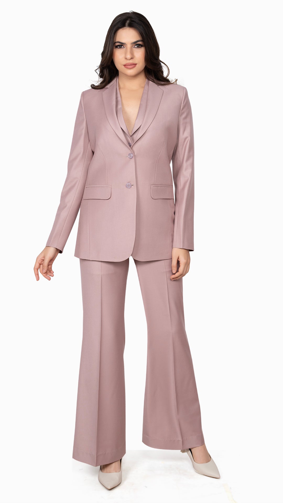 A structured two-piece suit featuring a single-breasted blazer and flared trousers in a soft onion pink shade. Perfect for modern power dressing.