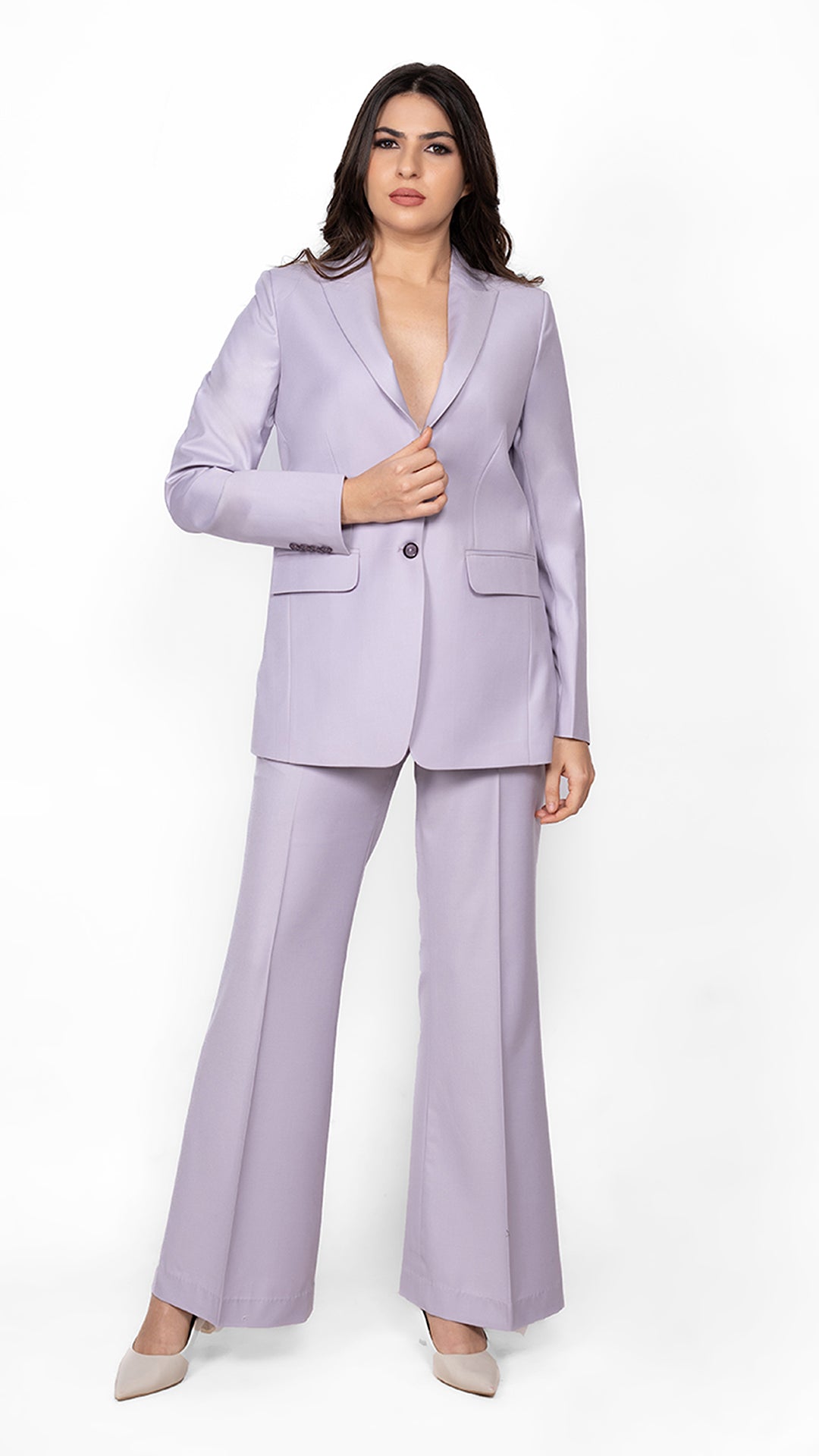 A contemporary two-piece suit in lavender, designed with a structured blazer and streamlined trousers for a chic yet powerful aesthetic.

