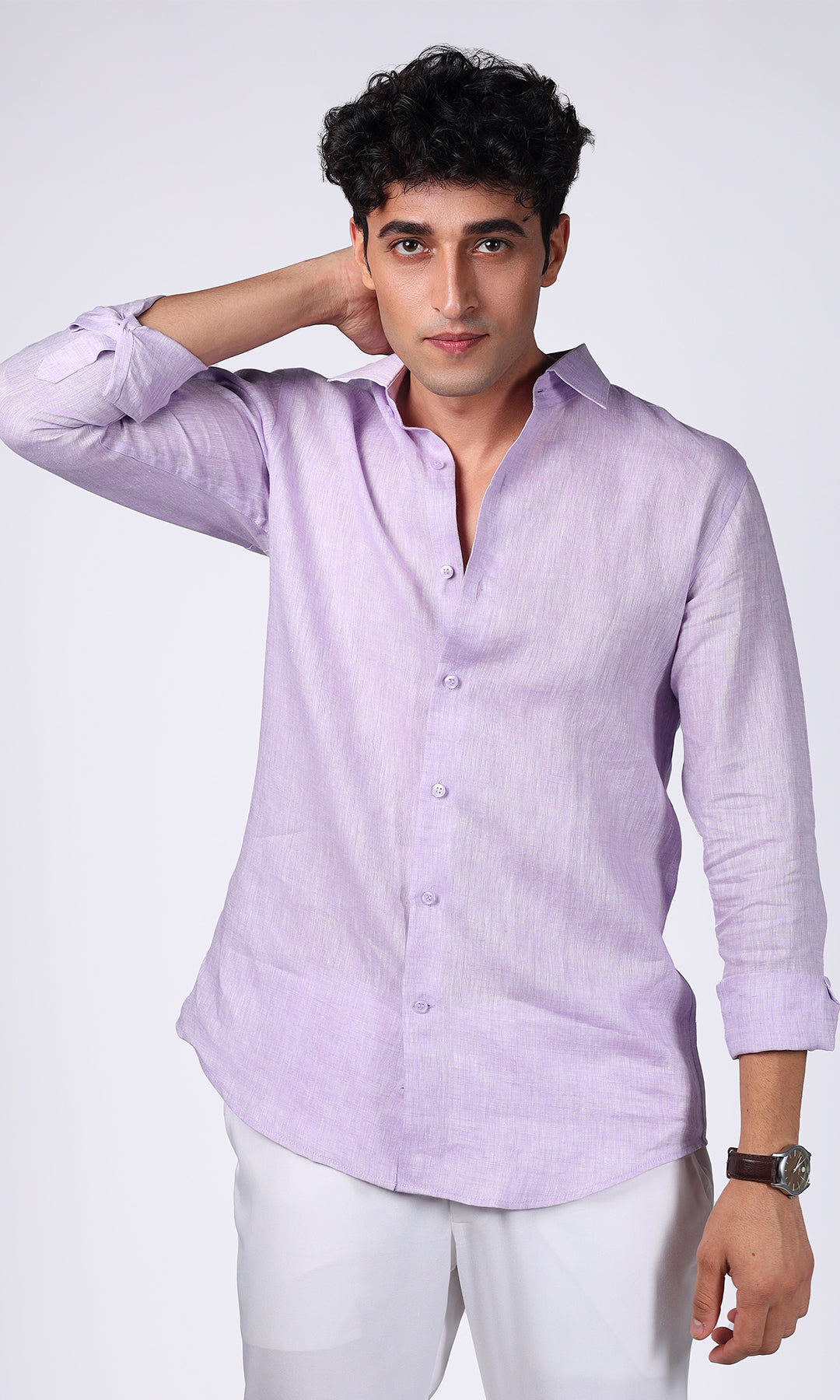 Lavender linen shirt on a model, close-up to capture the subtle texture and quality.