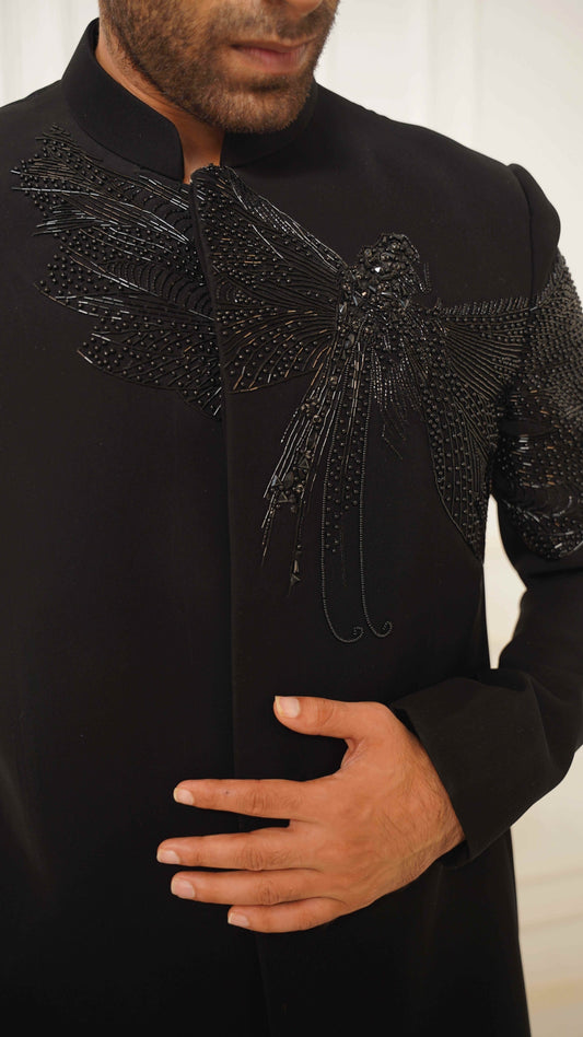 Black embroidered jodhpuri with a dragon fly visible on the shoulder.